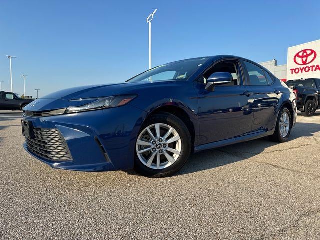 2025 Toyota Camry LE (SE) in Reservoir Blue — front three-quarter view