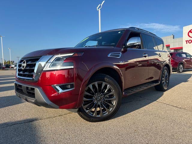 2022 Nissan Armada 4x2 Platinum in Coulis Red Pearl — front three-quarter view