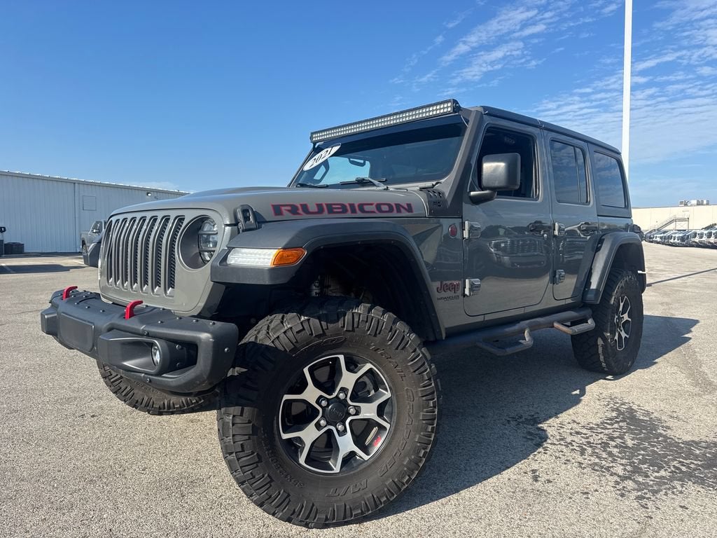 2021 Jeep Wrangler Unlimited Rubicon in Sting-Gray Clearc — front three-quarter view