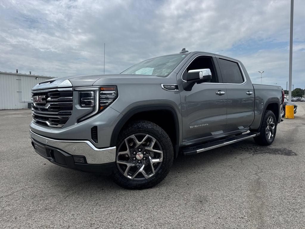 2024 GMC Sierra 1500 SLT in Sterling Metallic — front three-quarter view