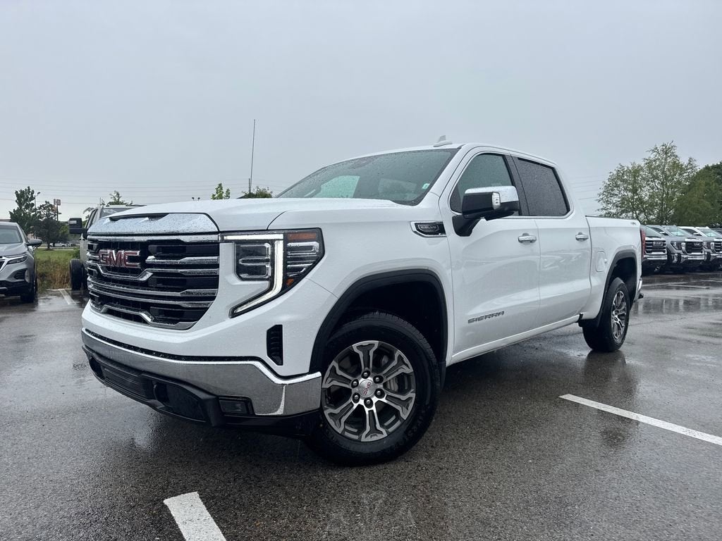 2025 GMC Sierra 1500 SLT in Summit White — front three-quarter view