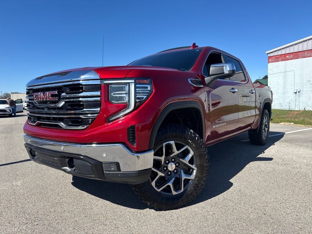 2024 GMC Sierra 1500 SLT in Volcanic Red Tintcoat — front three-quarter view