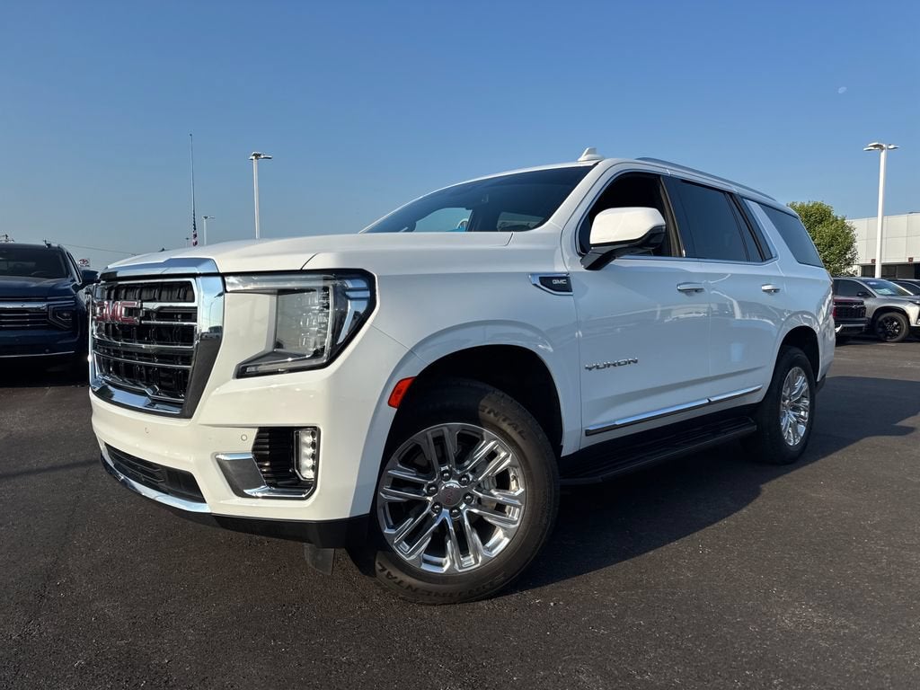 2024 GMC Yukon SLT in Summit White — front three-quarter view