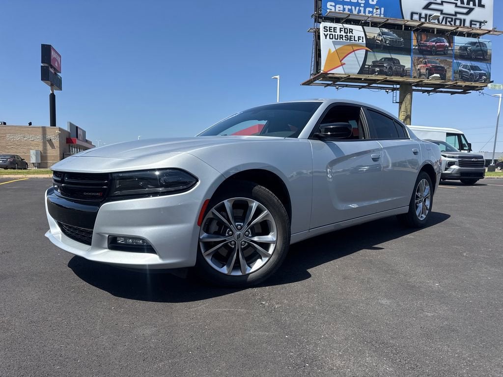 2023 Dodge Charger SXT in Triple Nickel Cle — front three-quarter view