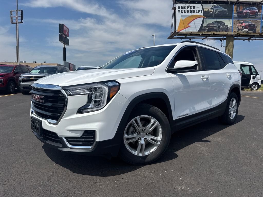2023 GMC Terrain SLE in Summit White — front three-quarter view