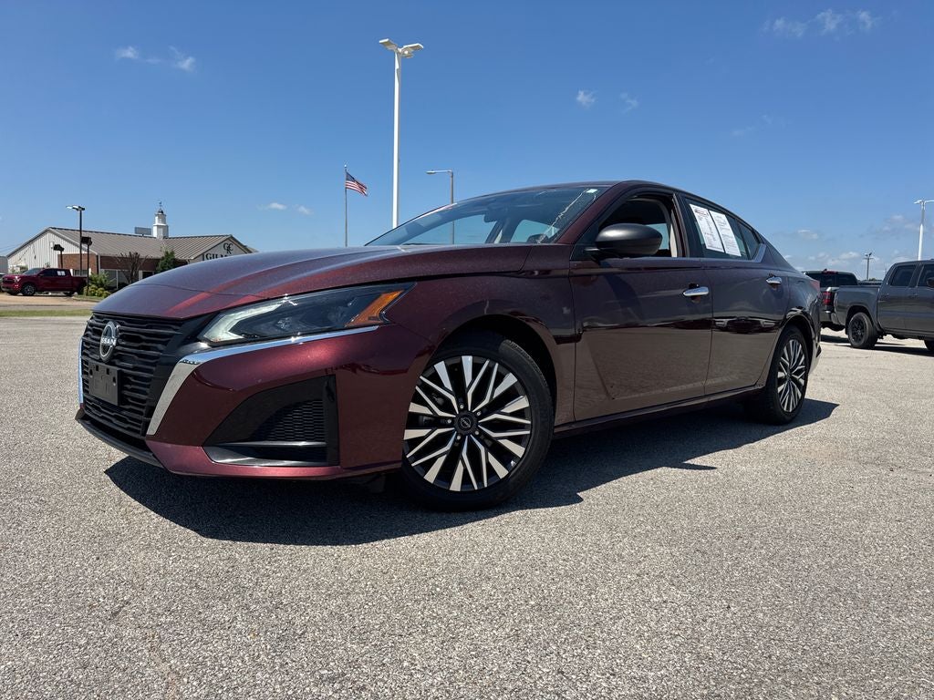 2025 Nissan Altima 2.5 SV in Garnet Pearl — front three-quarter view