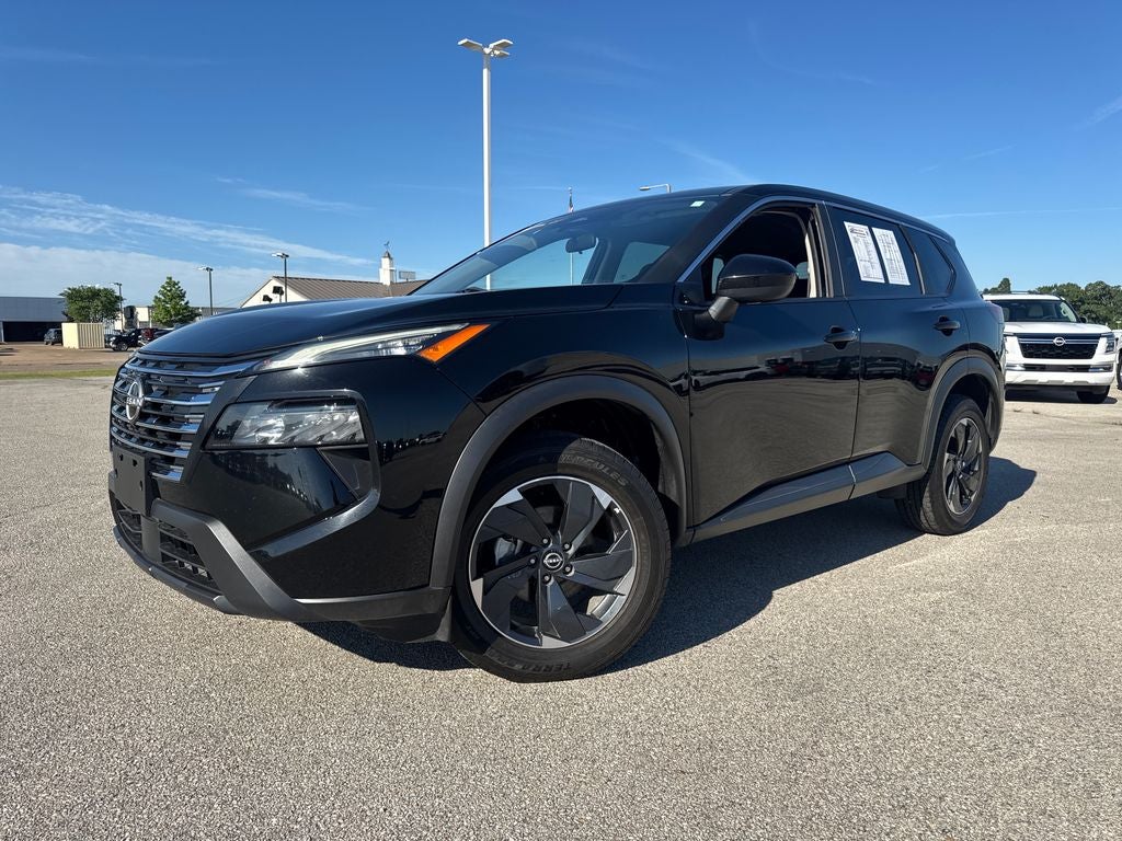 2024 Nissan Rogue SV in Super Black — front three-quarter view