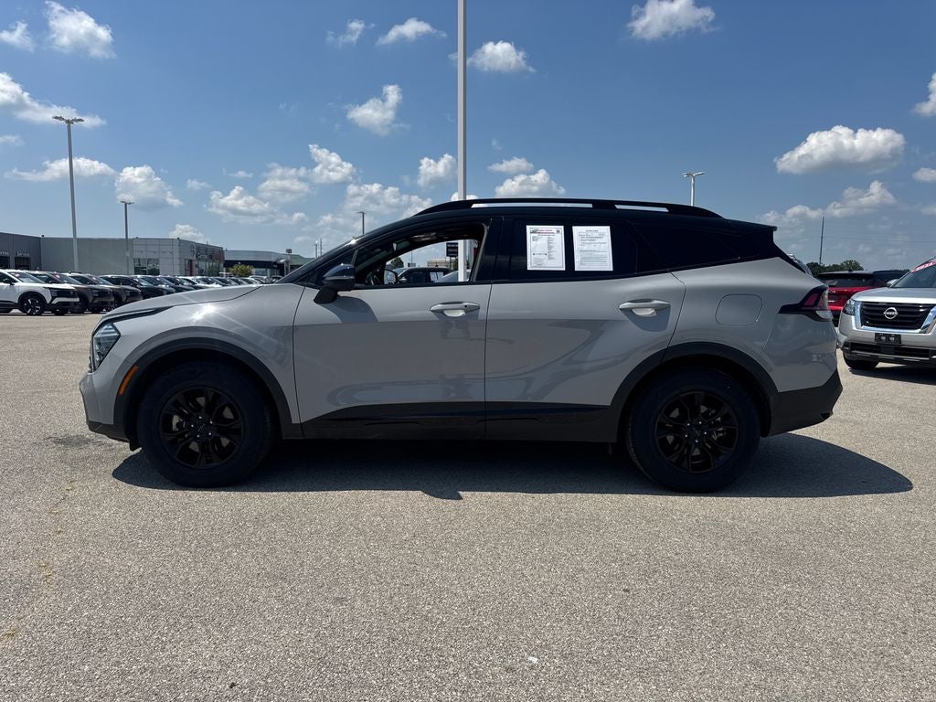 2025 Kia Sportage — rear three-quarter view