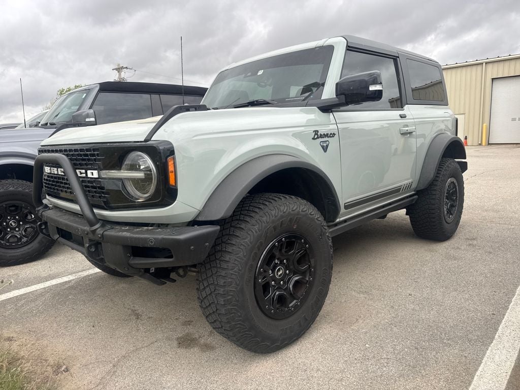 2021 Ford Bronco First Edition in Cactus — front three-quarter view
